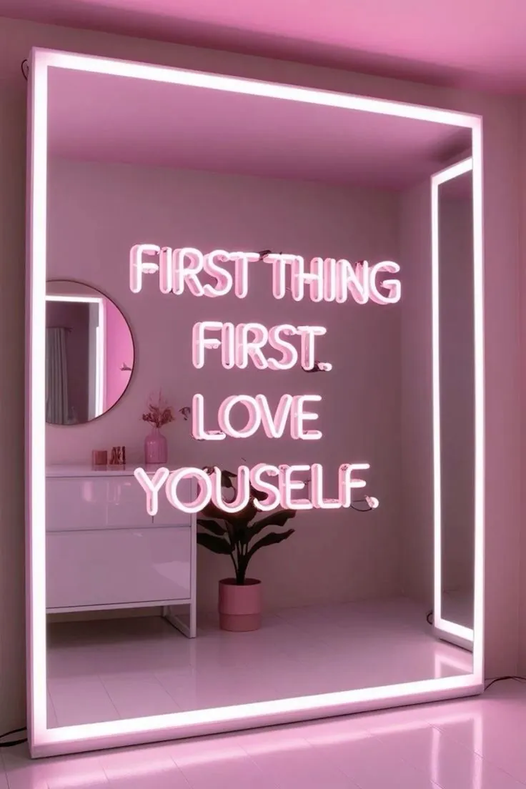 Neon sign reading love yourself