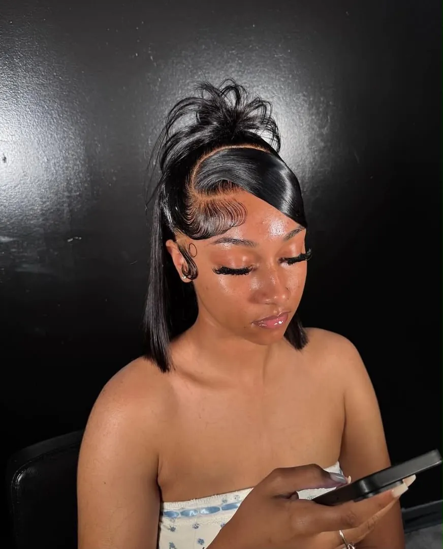 Sleek high ponytail with sculpted baby hair